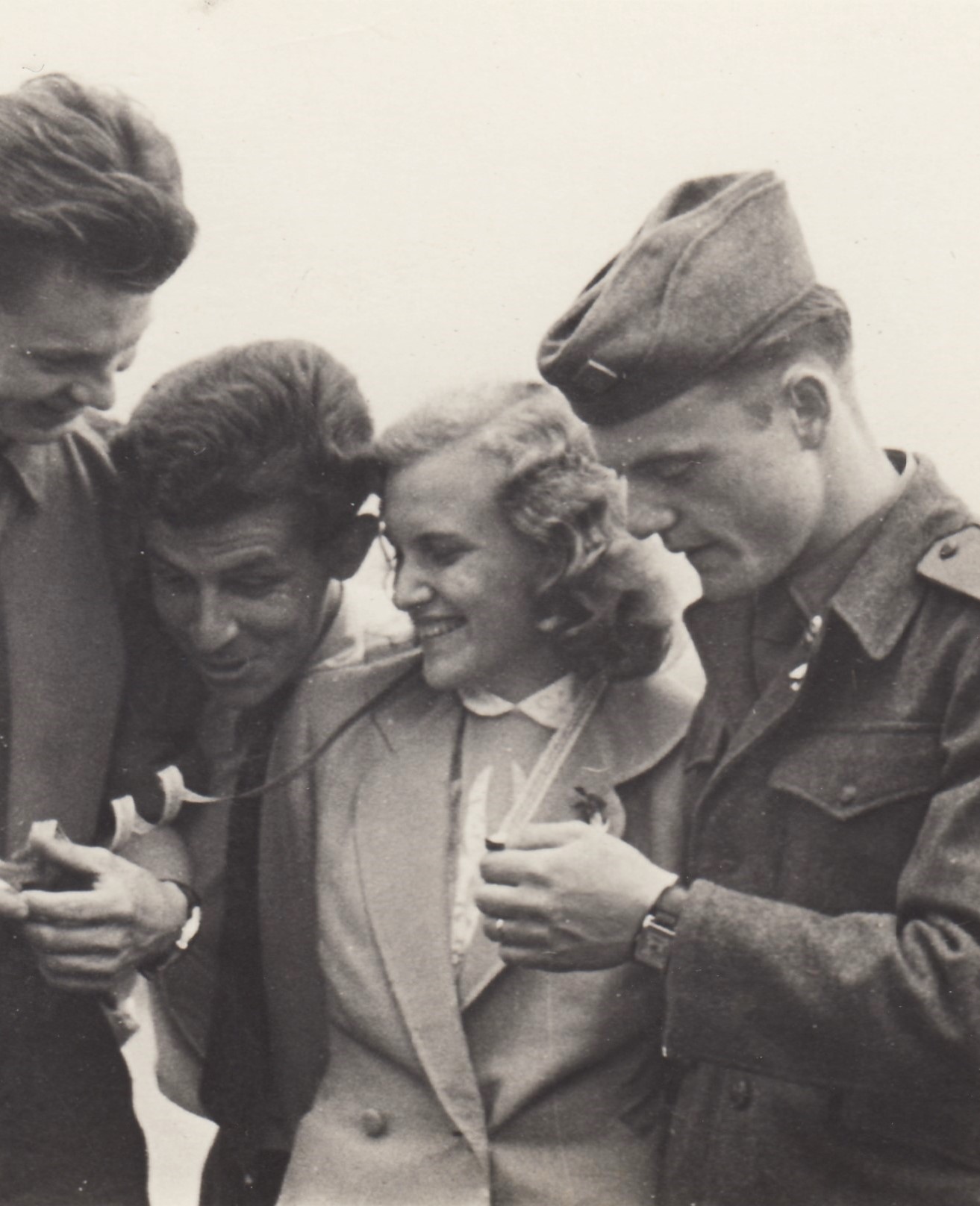 Naděje Dlouhá in 1954 in a wedding photo with her husband (far right) and friends