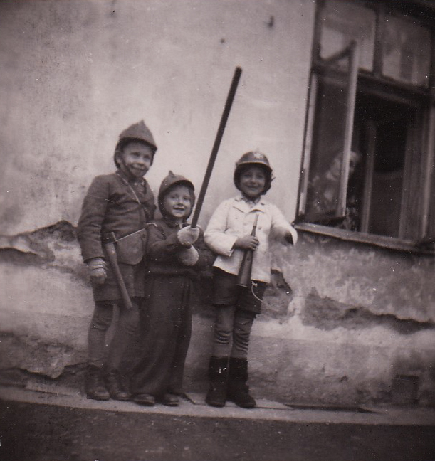 Children in Nýrsko after the war (Johann with the hatchet)