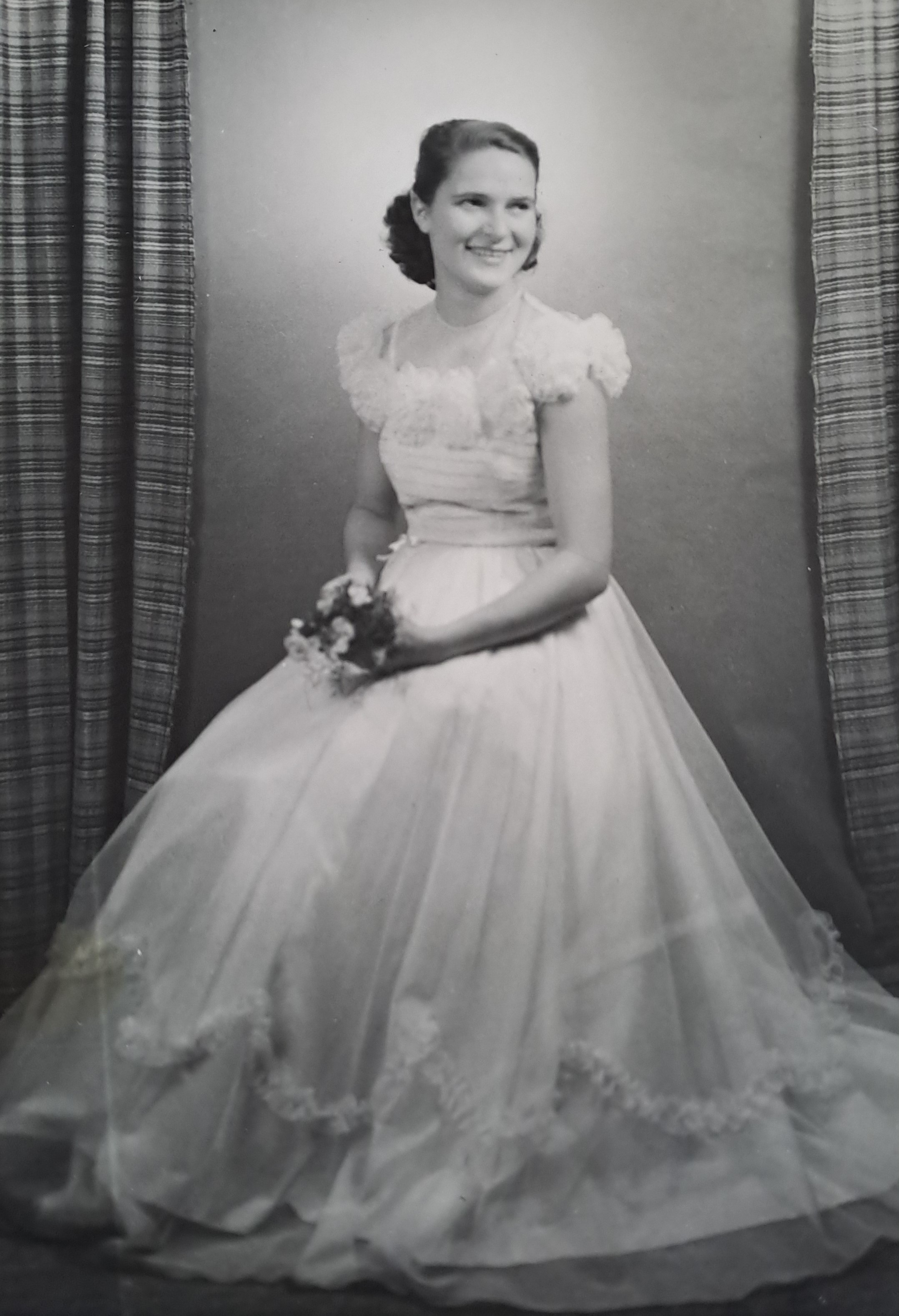 Věra Pavlovcová in her dance class graduation dress, early 1950s; her father was in prison in Valdice at the time