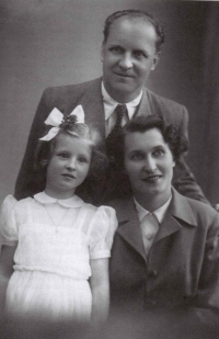 With her parents in 1951