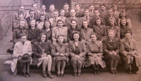 At a grammar school in Prague's 8th district, 1944 - 1945, with Tuxa, a teacher, the witness is in the first row 