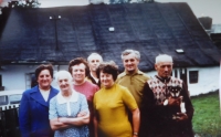 The family in front of their house in Hynčice nad Moravou