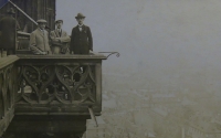 At the Eiffel tower in Paris, her father on the right 