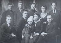 Her father Antonín with a youth brigade and his daughter (in the middle), circa 1934 

