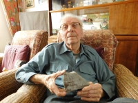 František Šenekl in 2019 with a stone from Nordhausen, where he was totally deployed