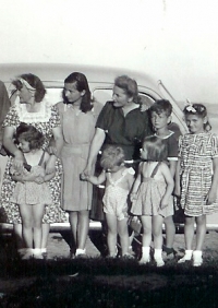 Summer 1950 in Zvíkov. The woman in the darker dress is Jan Hlach´s mother (he is the boy next to her on the right, his siblings are in front of them). Olga Hlachová was arrested shortly after it.  