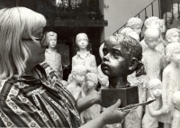 Marie Uchytilová with a bust of a girl from Lidice (1970s)