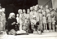 Marie Uchytilová working on the sculptural group of Lidice children (1981)