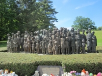 There are always flowers and toys in front of the Lidice memorial 