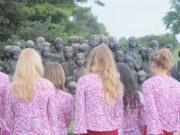Choir girls in front of the memorial (2015) 