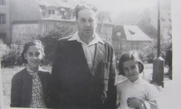With dad and sister on a walk, 1957