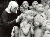 Marie Uchytilová retouching the sculptural group of Lidice children