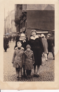 Zdeněk with his grandmother, mother and brother