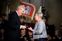 Sylvia Klánová accepting the First Grade of the Medal of Merit for sculptor Marie Uchytilová from president Miloš Zeman (October 28, 2013)