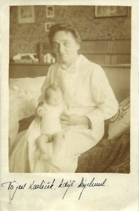 Karel Dostál - husband as a baby with a midwife