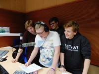 Recording a news report on the radio