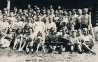 Father Wolfgang Jankovec, fourth from the right in the third row, wearing a white shirt with a bow tie, 1936
