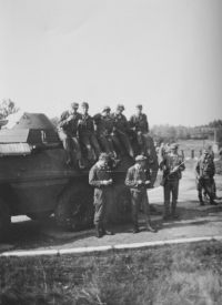Evžen Adámek in the photo at the bottom left of the basic military service in front of the armored personnel carrier he was driving