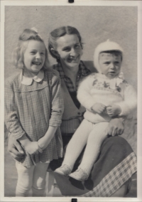 With her mother and brother from the time her father was in prison, 1951 
