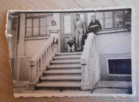 Ondrej Póda's family in front of their house: his aunt, Ondrej as a child, his father and his mother