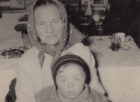 Miroslav at the age of one year with his great-grandmother (1960)