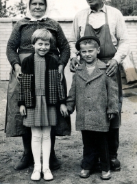 Dušan Skála with his sister and grandparents