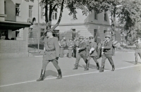 First husband Jan Hudáček, on the left, when carrying a flag in the Jiskra barracks in Olomouc where he had served 