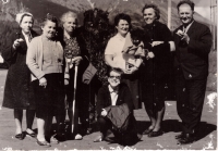 Family photo, witness at the bottom center, mother is on the left in the corner, 1960s.