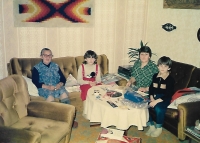The witness´s mother with her grandchildren and the witness. Christmas 1987, Újezd.