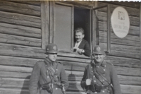 Father of Božena Pačandová (on the right) on duty in front of the municipal school in Dubová
