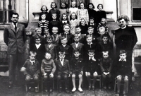 Josef Exner with schoolmates and teachers of the basic school in Hrabyně. 1946