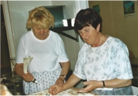 Witness (on the left) during a preparation of a feast at school 