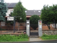 The entrance gate of the renovated building Famelia