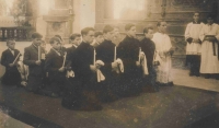 Confirmation in the church of St. Margaret in the Břevnov Monastery, Bořivoj Rak is the first one from the left, kneeling and wearing black
