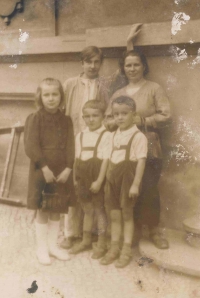 Tha Rak family, Ludmila, Jiří, mother Terezie from the left, Přemysl and Bořivoj are standing below