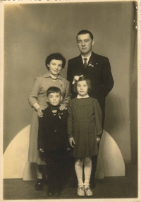 The Dvořák Family; Květa and Miloslav, son Miloslav (7) and daughter Ivanka (10). Photo from the wedding of Eva Lhoťanová's cousin, Ledeč nad Sázavou, April 1957