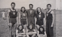With the coach Panáček, Milada Frantalová is standing on the left, 1940s 