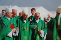 On the right Karel Janoušek leads Cardinal Tomáš Špidlík and on the left goes Bishop Vojtěch Cikrle