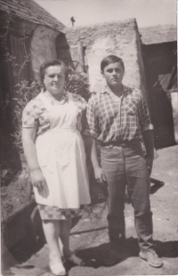 Radomil Lhotka and his mom Františka in the family backyard in Zahrádka