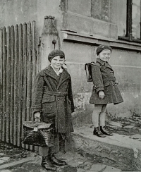 Olga and her brother on their way to school; 1931