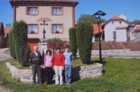 The Brož family in front of the house in Radňov (from the left: František Brož, granddaughter Markéta, daughter-in-law Eva, grandson Marek) 