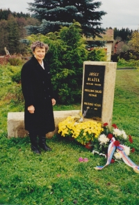Věra Rolečková by the memorial plaque for her father (1998)