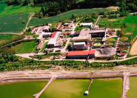 Aerial view of the production part of the ZCHU , in the foreground floating pumping station on tailing pond K I
