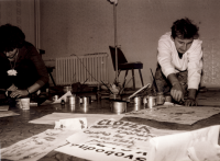Preparing signs for a demonstration, photo by Miloš Hofman; November 1989