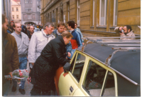 Václav Havel gives an autograph during his visit to Hradec Králové; January 1990 