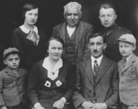 The family of his grandfather, Ludvík Rymeš, in 1935. From the left: uncle Václav, born 1929, mother Marie, born 1919, grandmother Marie, born 1890, great grandfather František Hintnaus, born 1852, grandfather Ludvík, born 1882, uncle František, born 1914, uncle Ludvík, born 1927