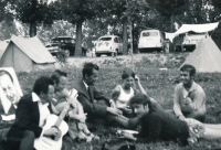 In a camp in Ilidža near Sarajevo shortly after the invasion; Antonín Špergl with a guitar, Petr Václavík lying on the ground 