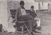 Václav Tuček with his grandfather on the farm bench in Bučovice