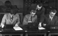 At the business school in Hlinsko, Václav sitting in the middle, (Ruda Baumbach on the right, Jiří Klvaňa on the left, professor Vašina standing between them) 