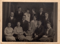 Parents, Josef Hrdý Sr. (sitting, second from the right) and next to him, Marie Polednová (standing, third from the right). Next to Marie Polednová, witness' uncle Václav Poledno (standing, third from the right). End of the 1920's